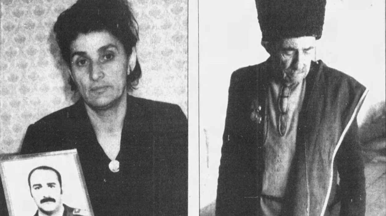 Venera Kogoniya (left) holds photograph of her brother, Alexei Kogoniya (October 1989).