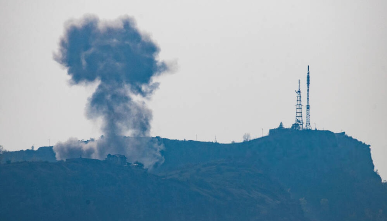 Smoke rises over the city of Shushi after the October 28 military strike. Smoke rises over the city of Shushi after the October 28 military strike.