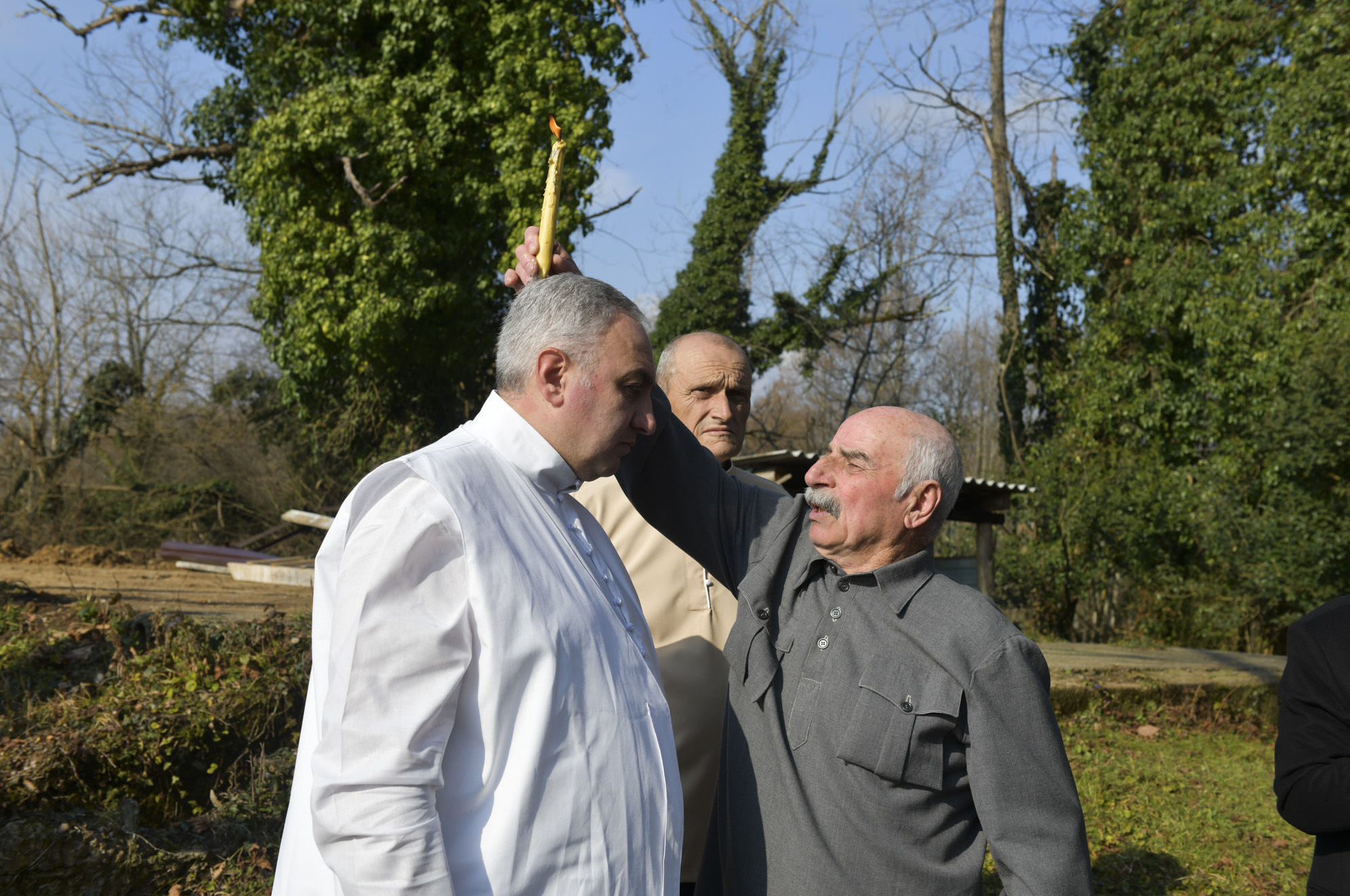 Priest of the Elyr-shrine Halter Shinkuba prays to the Almighty during the initiation ceremony of Ruslan Berzek.