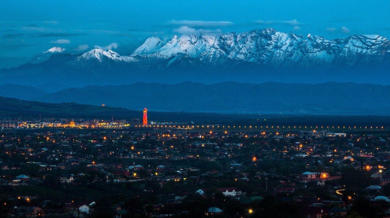 Panoramic view of Magas, Ali-yurt, and Ekazhevo with the Caucasus Mountains as a backdrop.