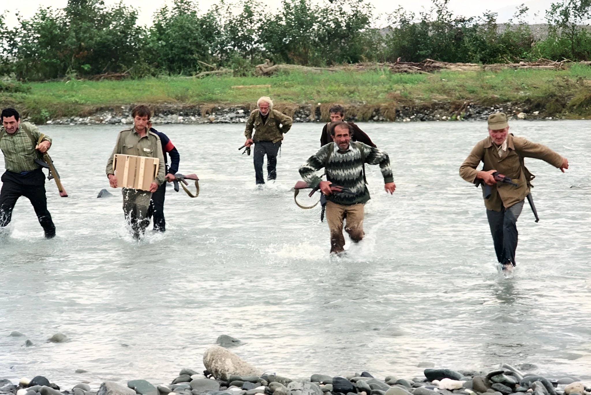 Abkhaz fighters cross the Gumista river. Georgian-Abkhazian conflict, (1993)