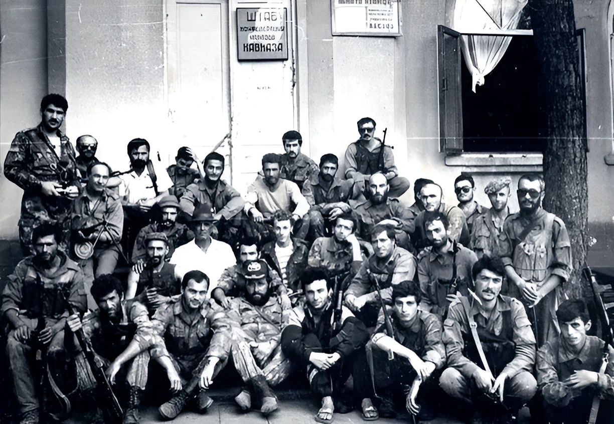 The volunteers in front of the headquarters of the Confederation of the Peoples of the Caucasus, Gudauta, 1992-1993 The volunteers in front of the headquarters of the Confederation of the Peoples of the Caucasus, Gudauta, 1992-1993