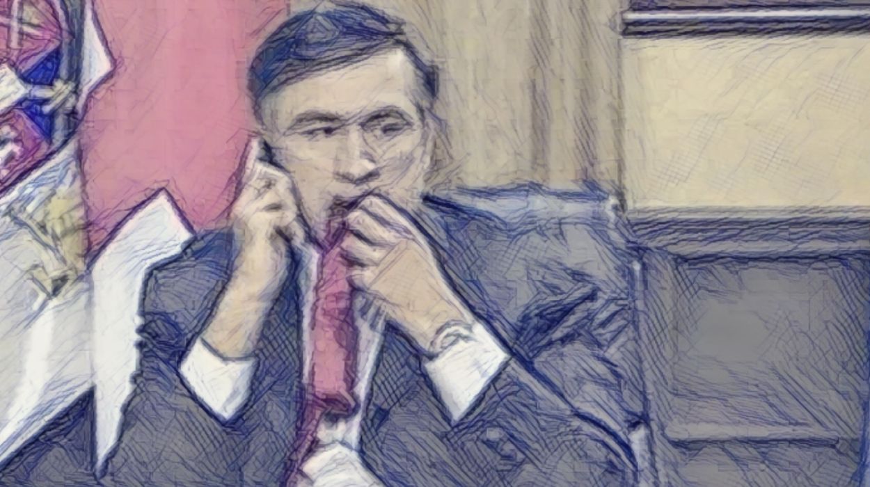Saakashvili chewing his tie (BBC News). Saakashvili chewing his tie (BBC News).