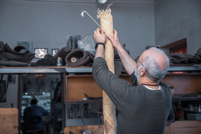 Batal Dzhapua creates ashamaka - a traditional Abkhazian candle.