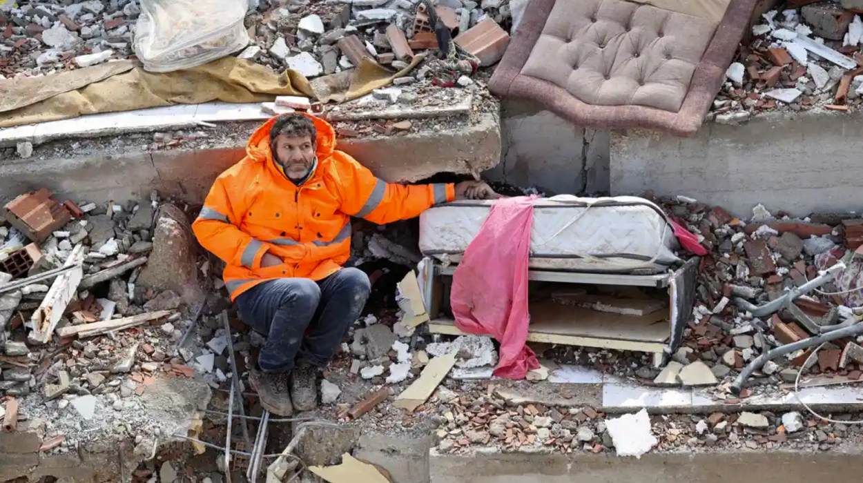 Mesut Hancer holds the hand of his 15-year-old daughter Irmak, who died in the earthquake in Kahramanmaras, close to its epicentre. Photograph: Adem Altan/AFP Mesut Hancer holds the hand of his 15-year-old daughter Irmak, who died in the earthquake in Kahramanmaras, close to its epicentre. Photograph: Adem Altan/AFP