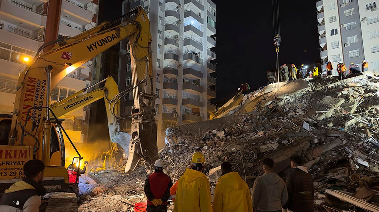 In Adana, workers employ heavy machinery in the search for survivors amid the rubble on Monday, February 6th.