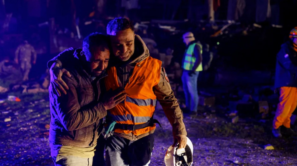 Volunteers share an emotional moment as they take part in a rescue operation in Hatay, Turkey. Volunteers share an emotional moment as they take part in a rescue operation in Hatay, Turkey.