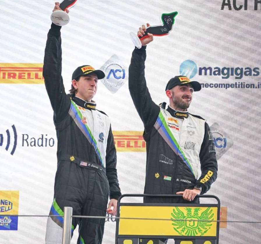 Abkhazian racer Dmitry Gvazava and co-driver Philippe Denes celebrate their victory