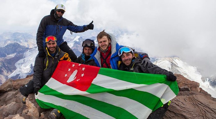 National Flag of Abkhazia Planted on the Summit of Aconcagua