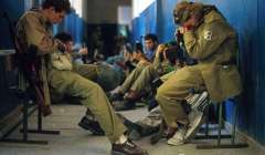 Abkhazian fighters sit in a hallway. September, 1993. Photo by Malcolm Linton.